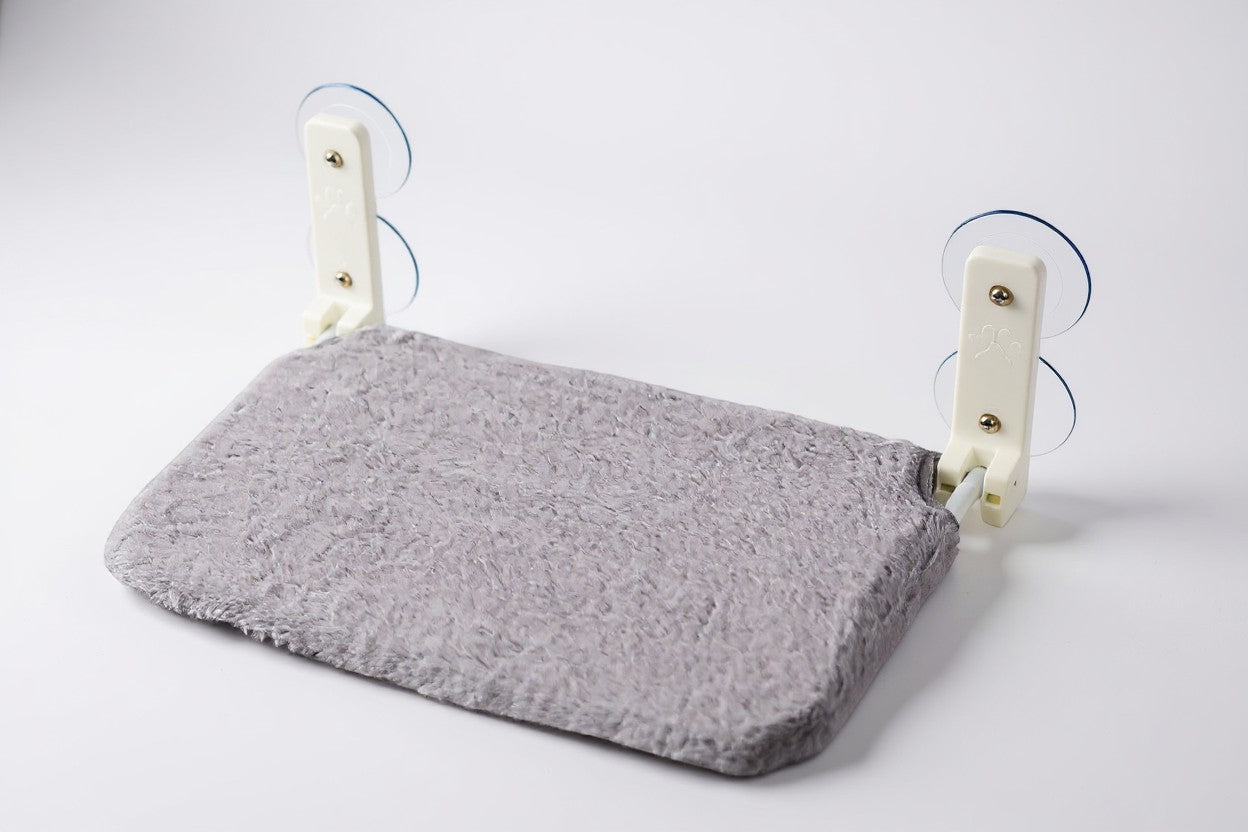 CatLoft grey plush window hammock with suction cups, no drill installation, comfortable perch for cats.